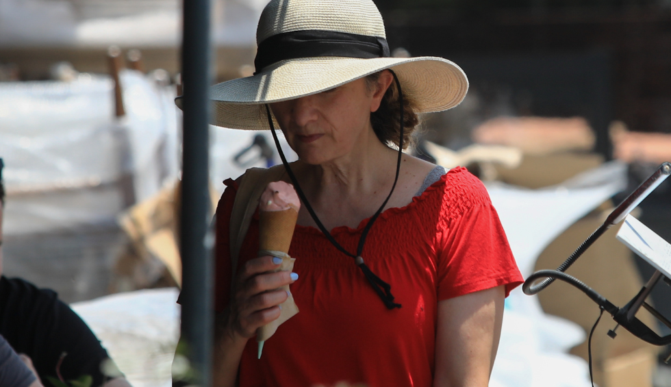 A generic square placeholder image with rounded corners in a figure.