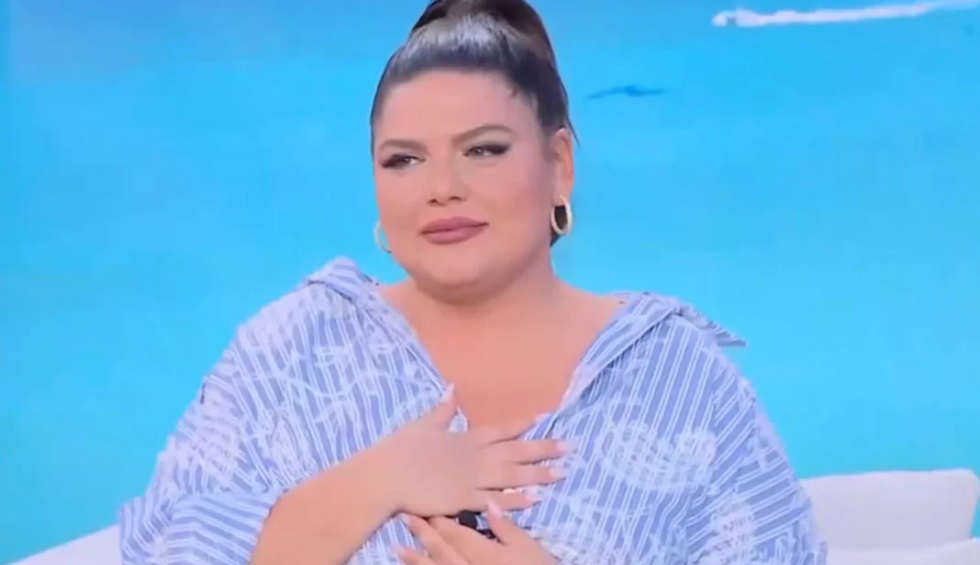 A generic square placeholder image with rounded corners in a figure.