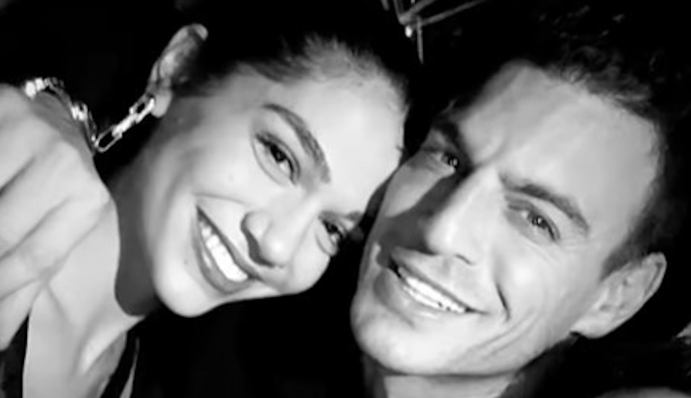 A generic square placeholder image with rounded corners in a figure.