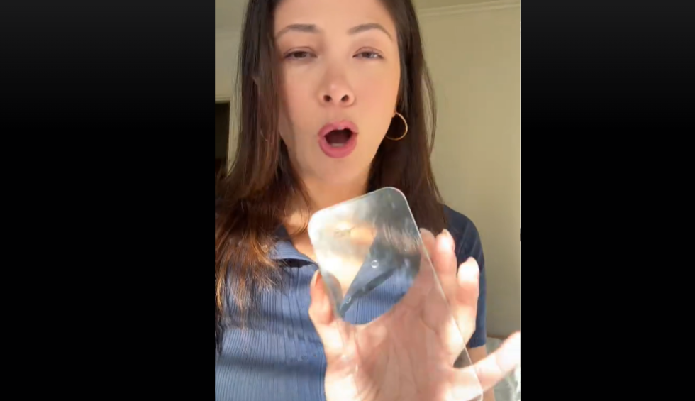 A generic square placeholder image with rounded corners in a figure.