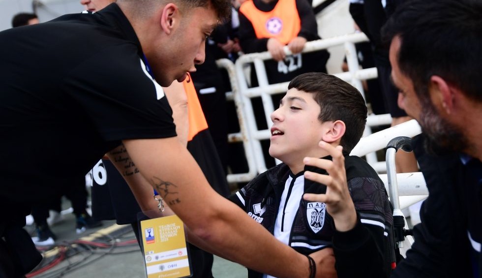 A generic square placeholder image with rounded corners in a figure.