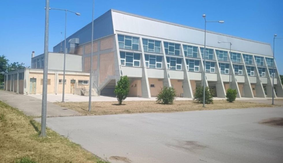 A generic square placeholder image with rounded corners in a figure.