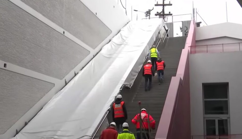 A generic square placeholder image with rounded corners in a figure.