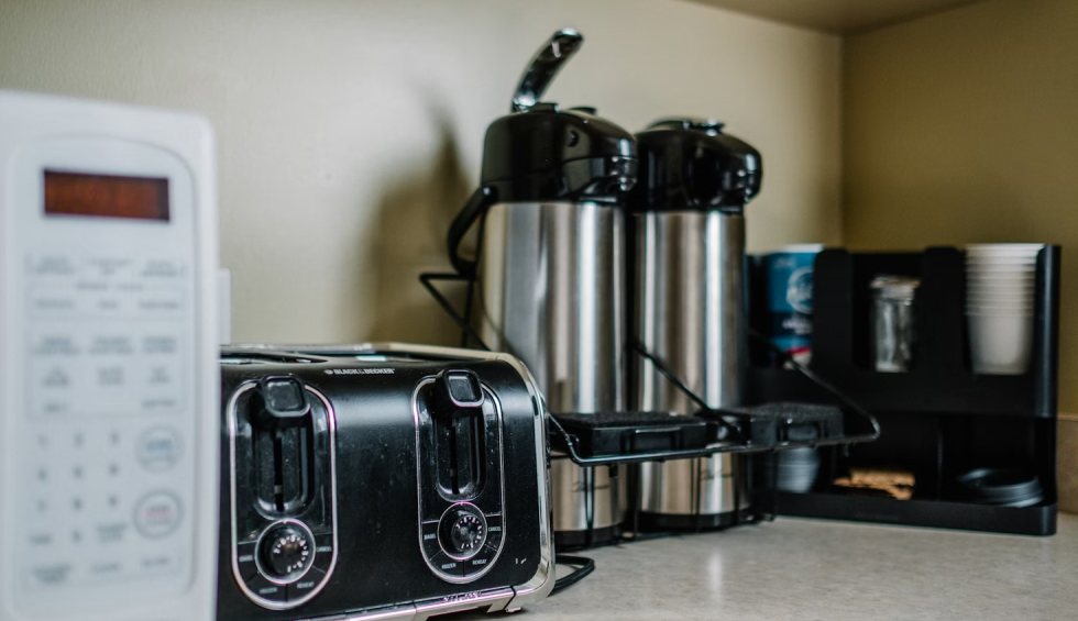 A generic square placeholder image with rounded corners in a figure.