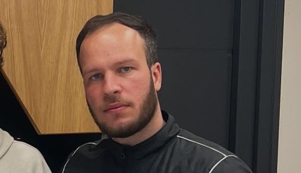 A generic square placeholder image with rounded corners in a figure.