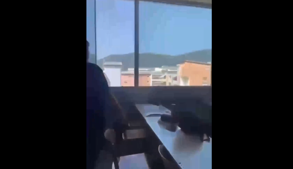 A generic square placeholder image with rounded corners in a figure.