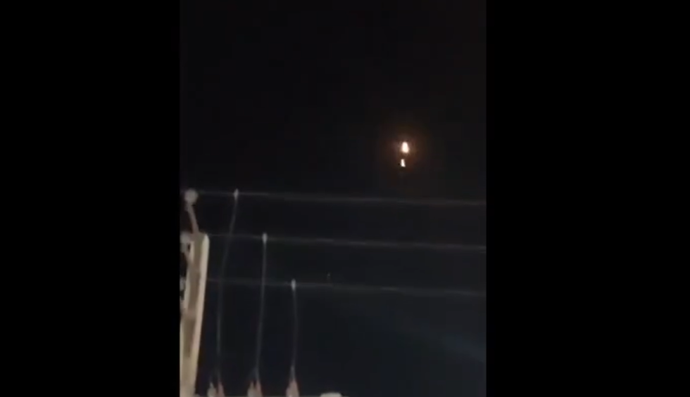 A generic square placeholder image with rounded corners in a figure.