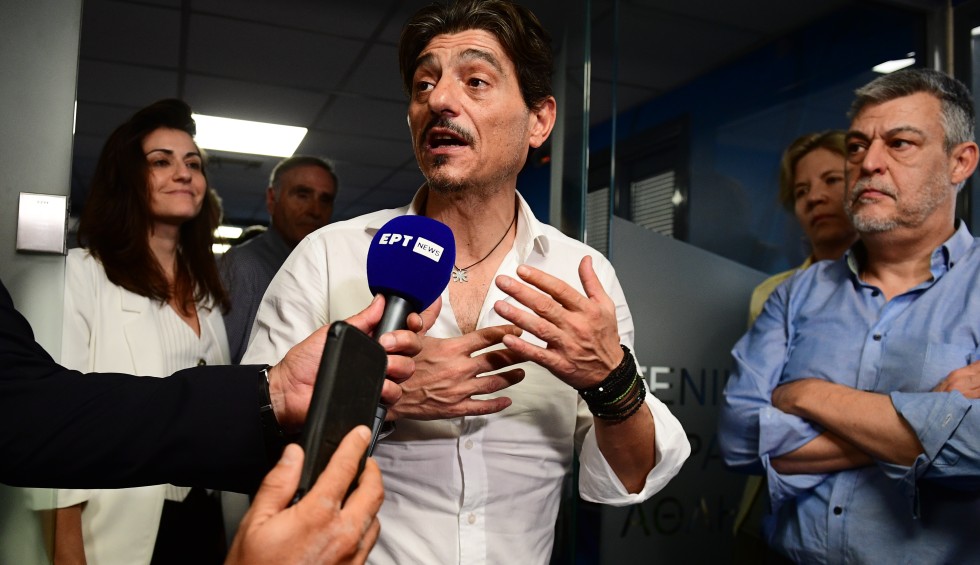 A generic square placeholder image with rounded corners in a figure.