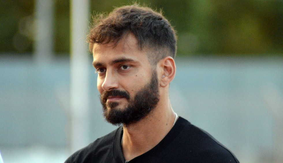 A generic square placeholder image with rounded corners in a figure.