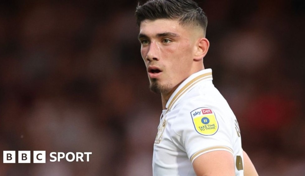 A generic square placeholder image with rounded corners in a figure.