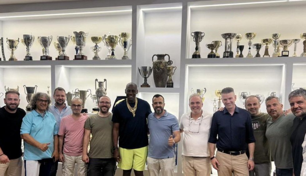 A generic square placeholder image with rounded corners in a figure.