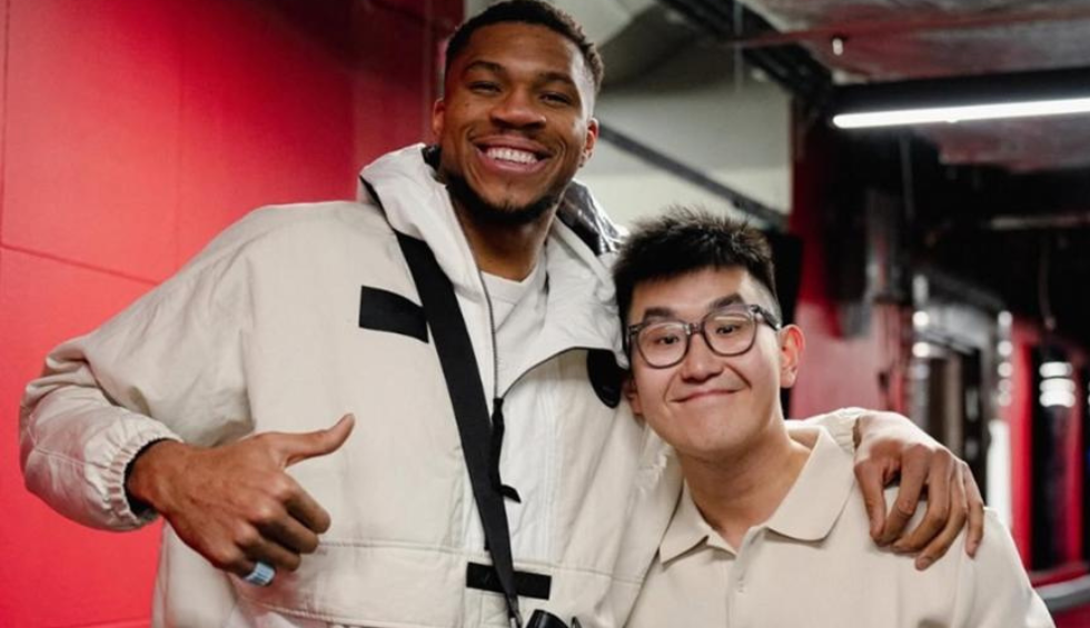 A generic square placeholder image with rounded corners in a figure.