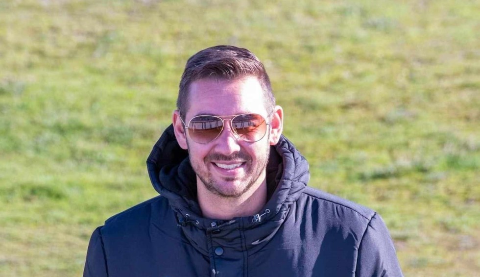 A generic square placeholder image with rounded corners in a figure.