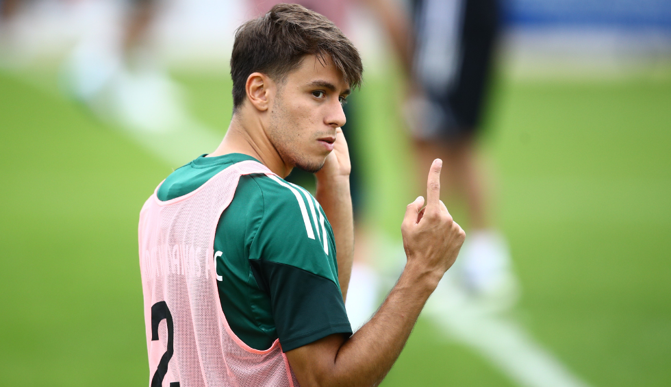 A generic square placeholder image with rounded corners in a figure.