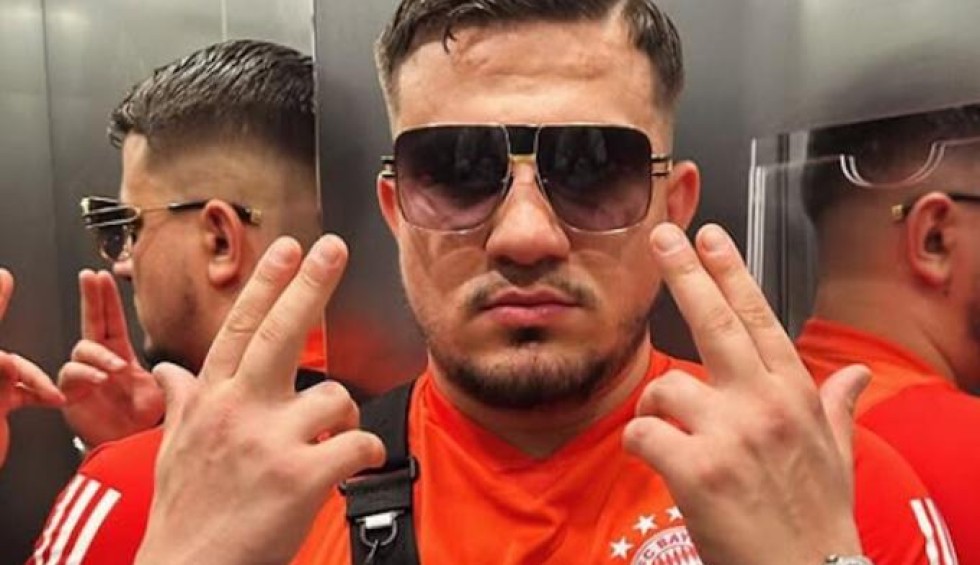 A generic square placeholder image with rounded corners in a figure.