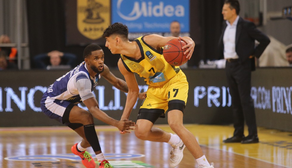 A generic square placeholder image with rounded corners in a figure.