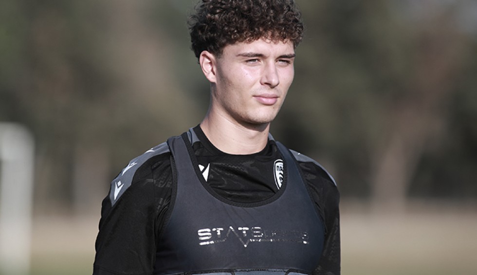 A generic square placeholder image with rounded corners in a figure.