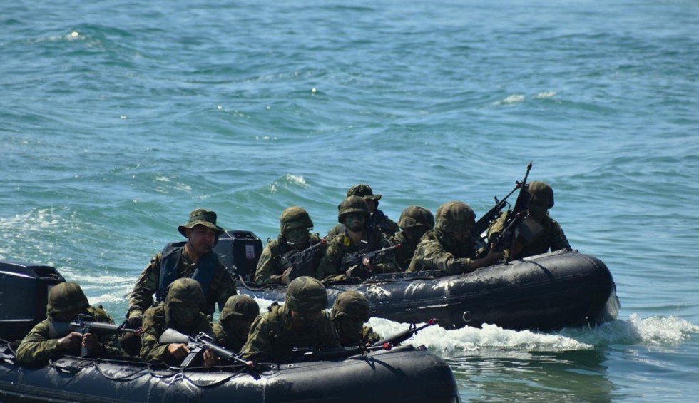 A generic square placeholder image with rounded corners in a figure.