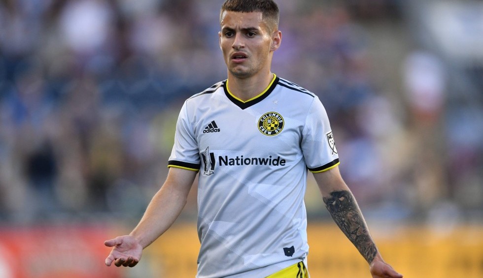 A generic square placeholder image with rounded corners in a figure.