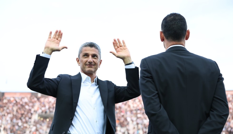 A generic square placeholder image with rounded corners in a figure.