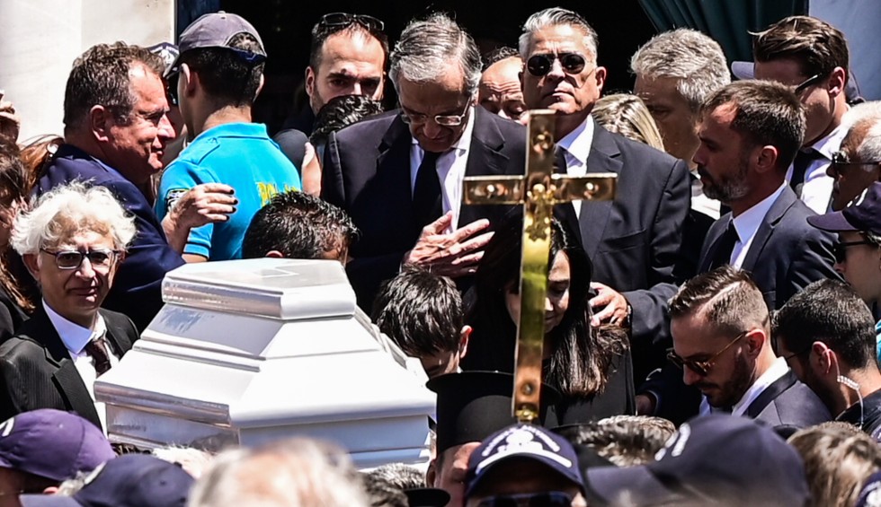 A generic square placeholder image with rounded corners in a figure.