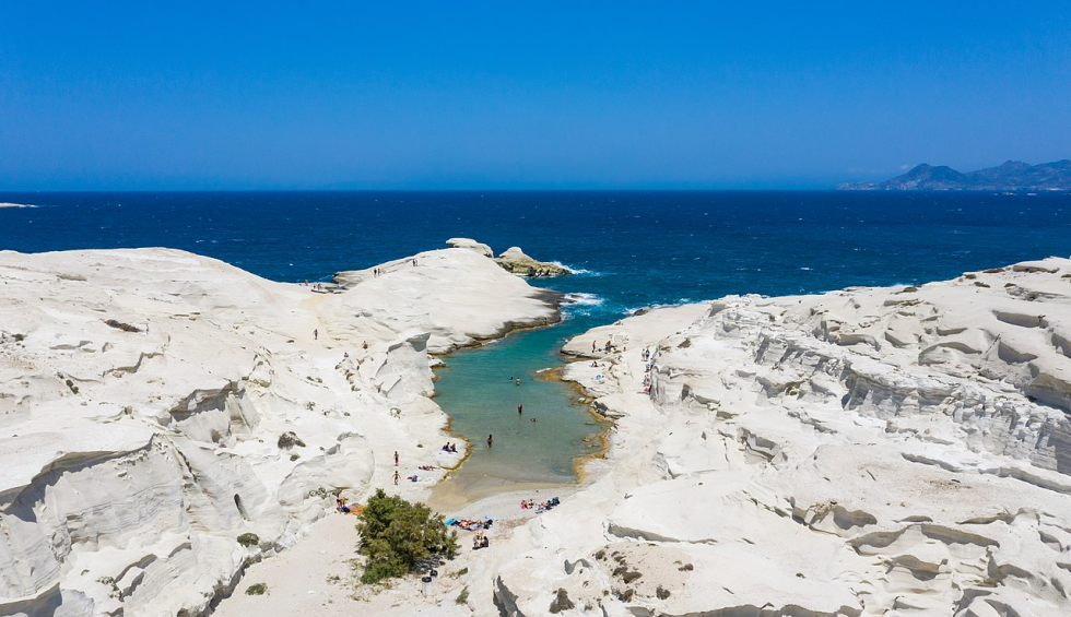 A generic square placeholder image with rounded corners in a figure.