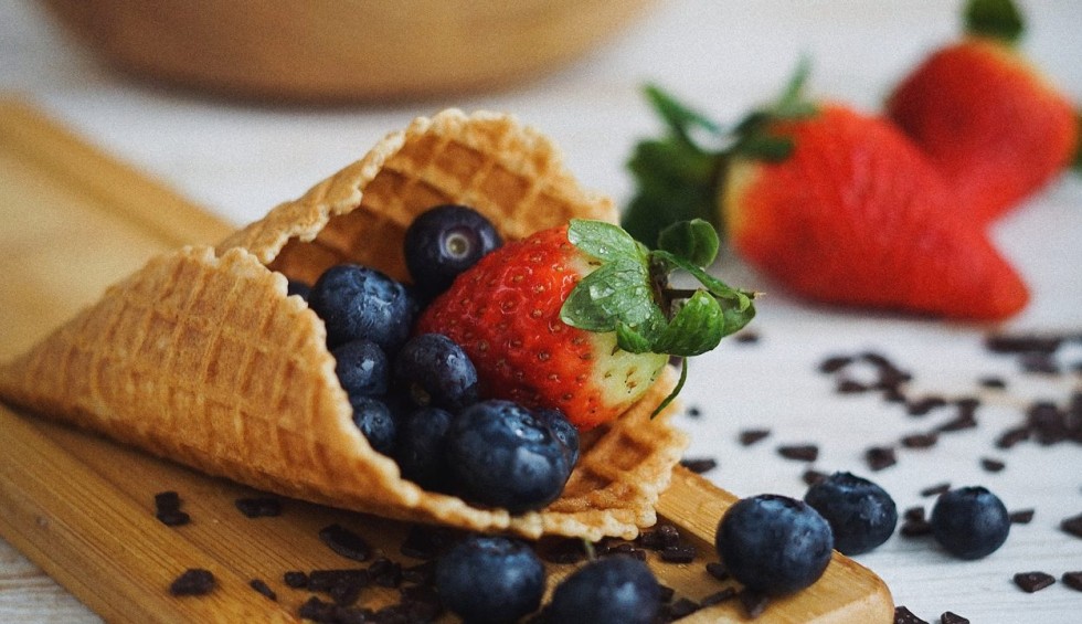 A generic square placeholder image with rounded corners in a figure.