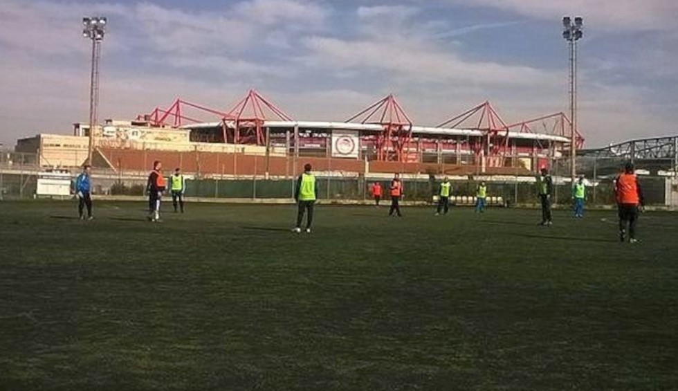 A generic square placeholder image with rounded corners in a figure.