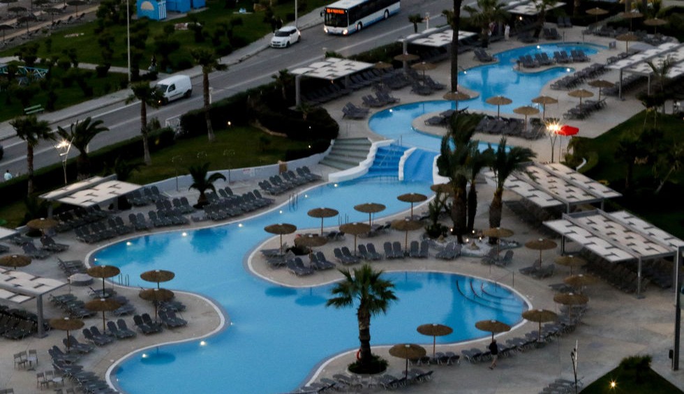 A generic square placeholder image with rounded corners in a figure.