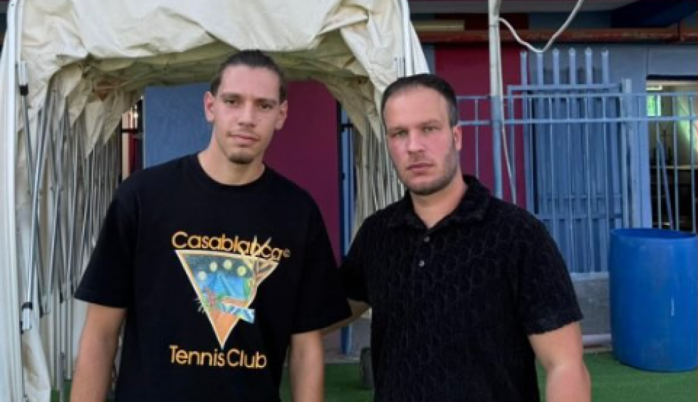 A generic square placeholder image with rounded corners in a figure.