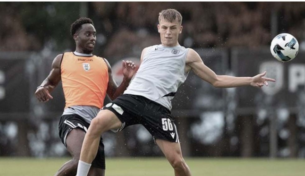 A generic square placeholder image with rounded corners in a figure.