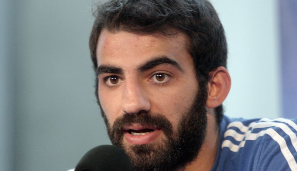 A generic square placeholder image with rounded corners in a figure.