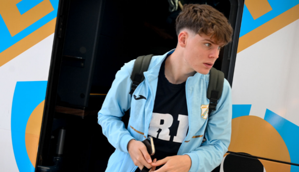 A generic square placeholder image with rounded corners in a figure.