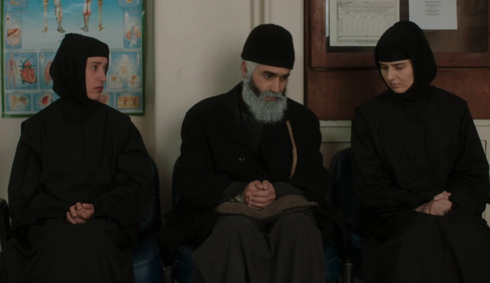 A generic square placeholder image with rounded corners in a figure.