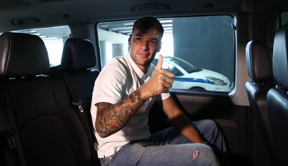 A generic square placeholder image with rounded corners in a figure.