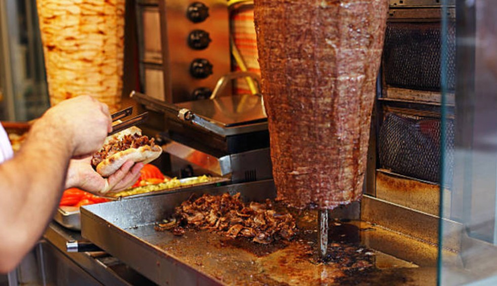 A generic square placeholder image with rounded corners in a figure.