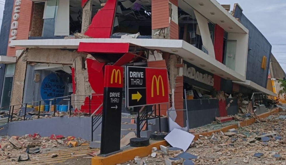 A generic square placeholder image with rounded corners in a figure.