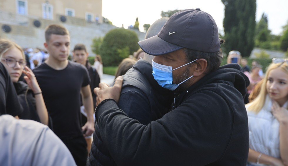 A generic square placeholder image with rounded corners in a figure.