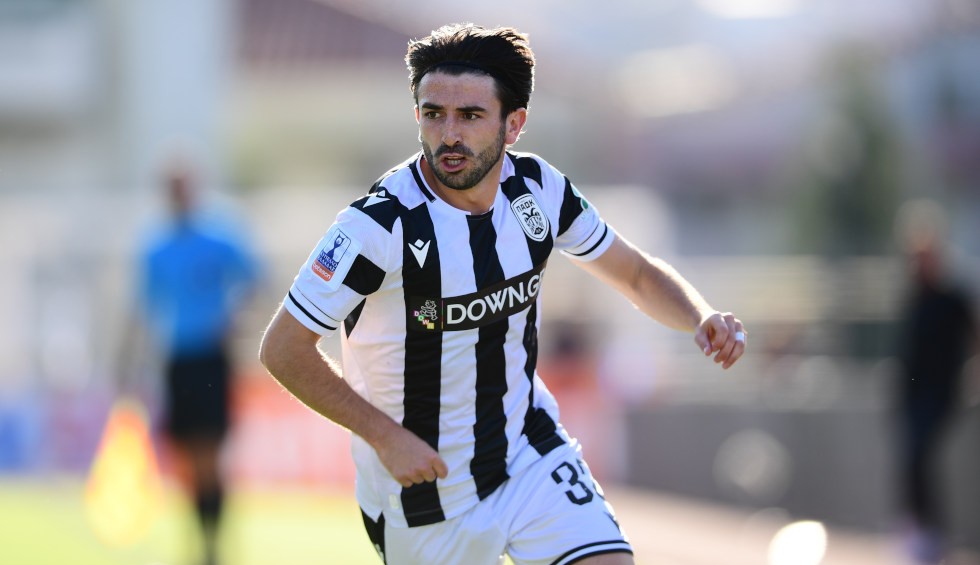 A generic square placeholder image with rounded corners in a figure.