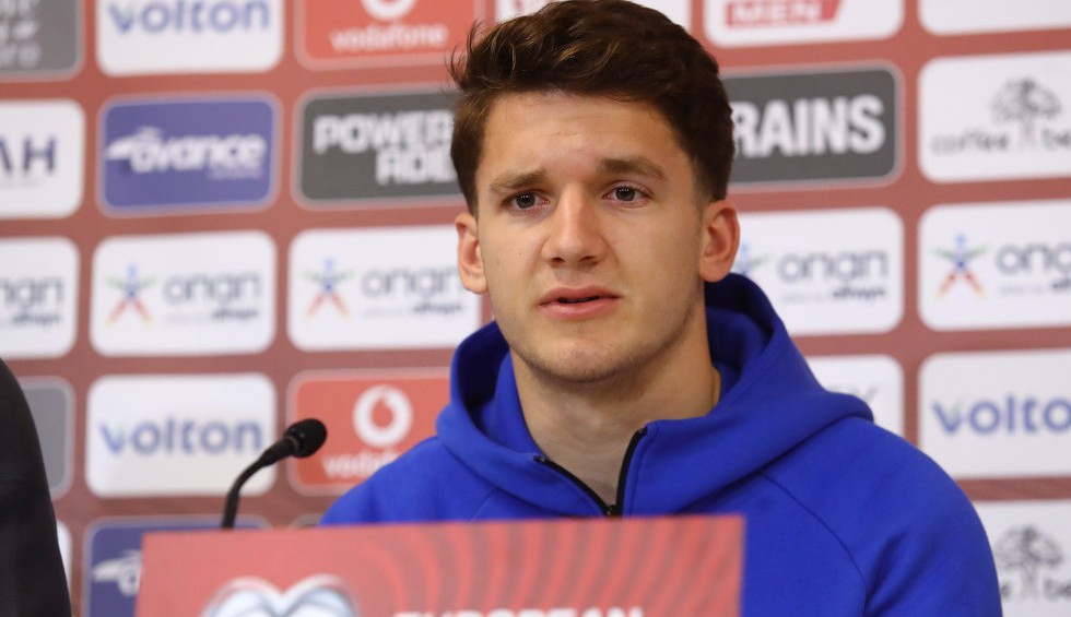 A generic square placeholder image with rounded corners in a figure.