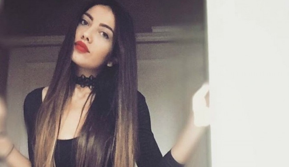 A generic square placeholder image with rounded corners in a figure.