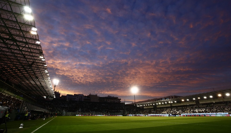 A generic square placeholder image with rounded corners in a figure.