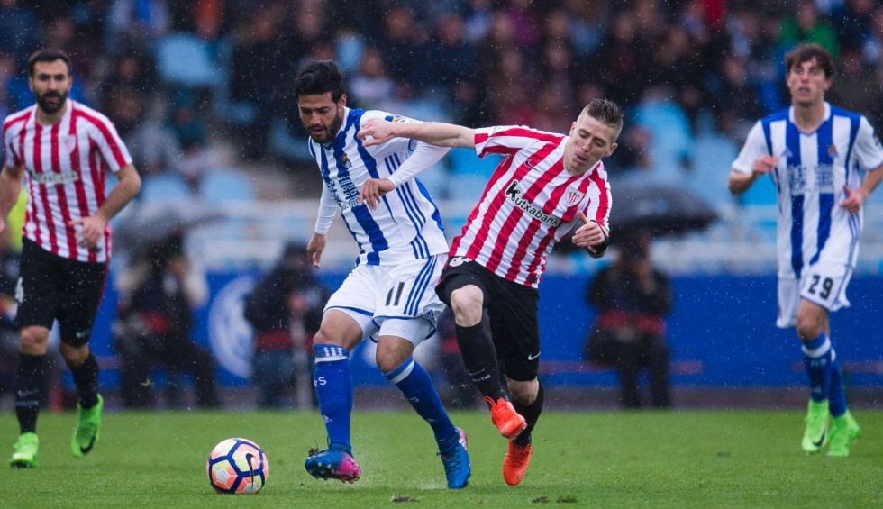 A generic square placeholder image with rounded corners in a figure.