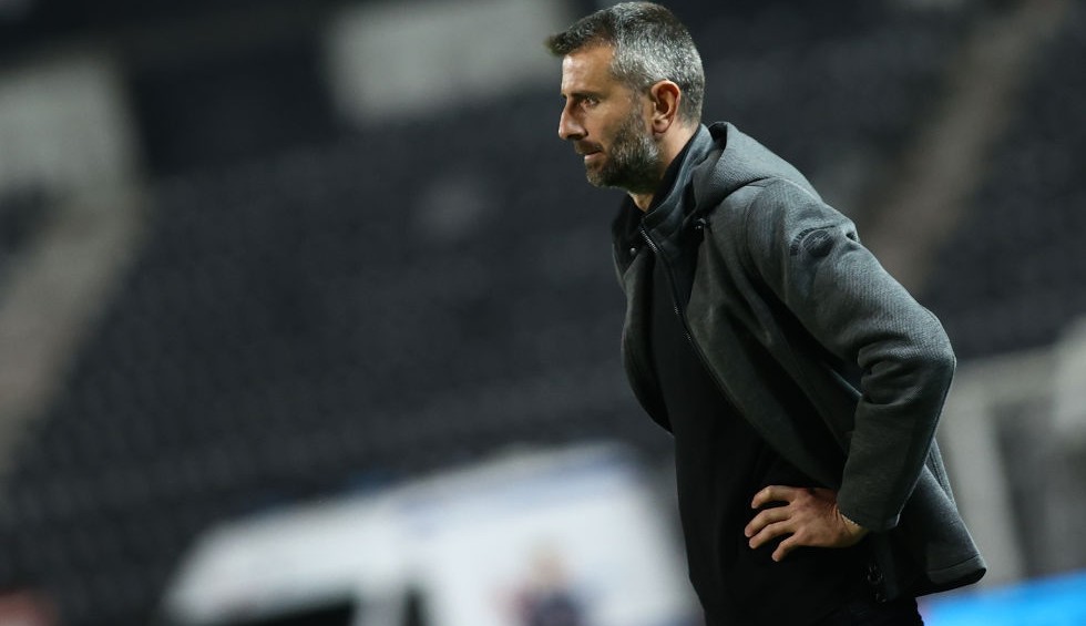 A generic square placeholder image with rounded corners in a figure.