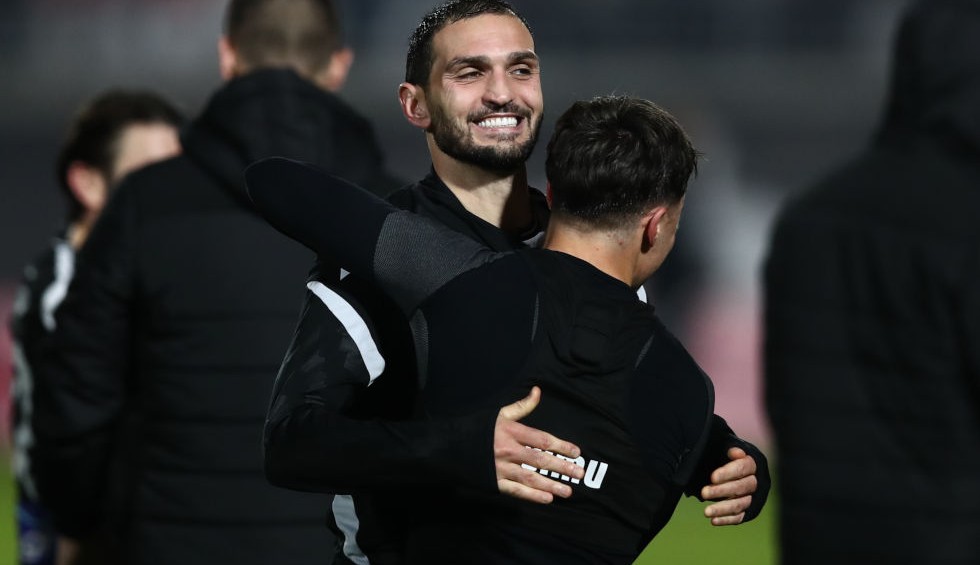 A generic square placeholder image with rounded corners in a figure.