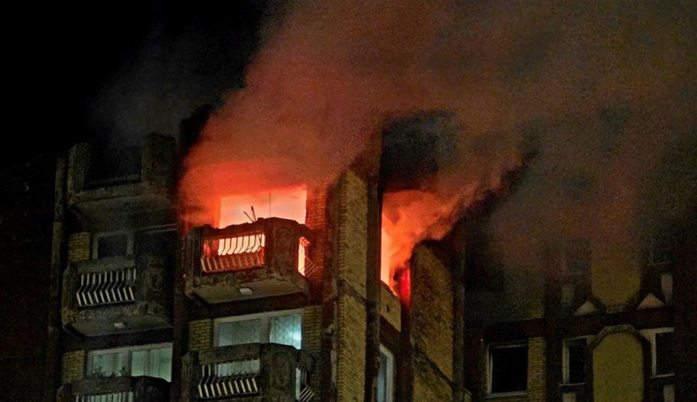 A generic square placeholder image with rounded corners in a figure.