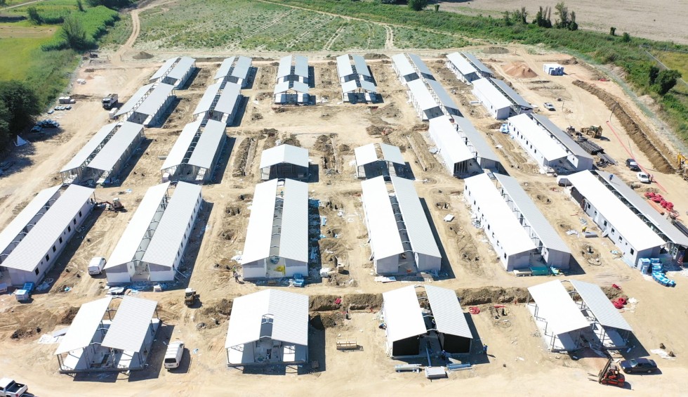 A generic square placeholder image with rounded corners in a figure.