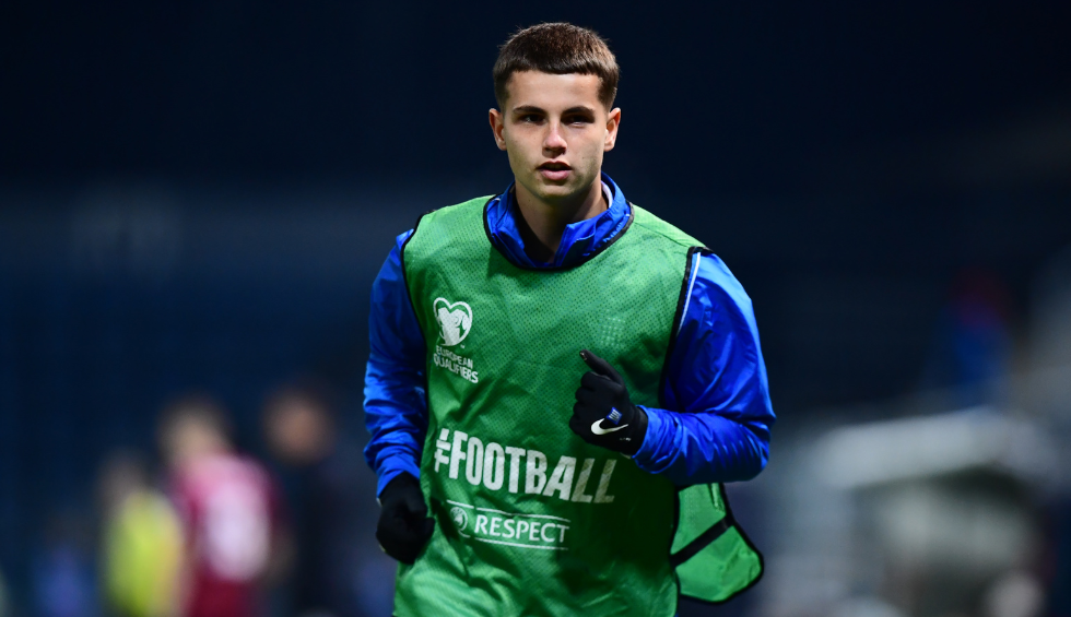 A generic square placeholder image with rounded corners in a figure.