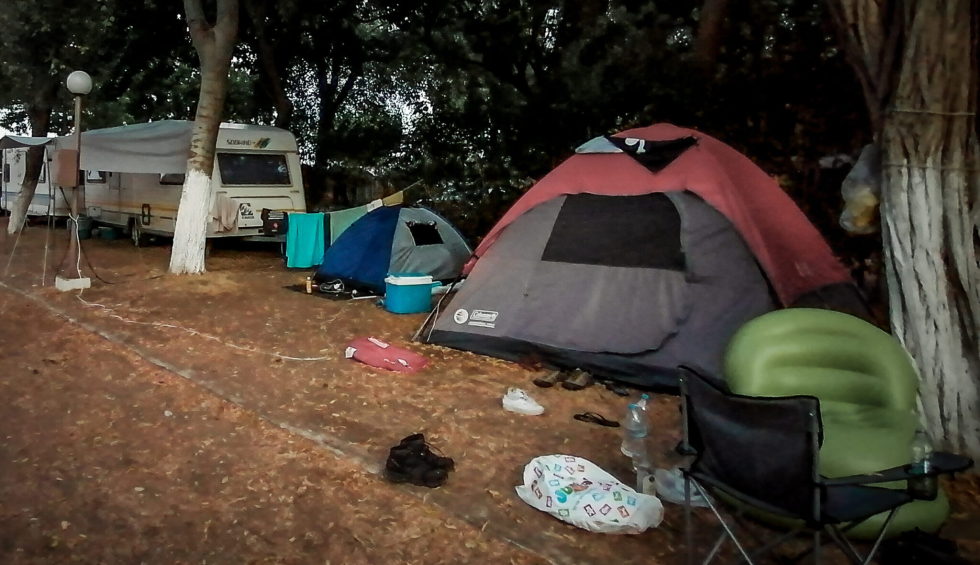 A generic square placeholder image with rounded corners in a figure.