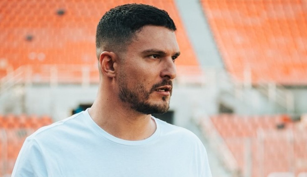 A generic square placeholder image with rounded corners in a figure.